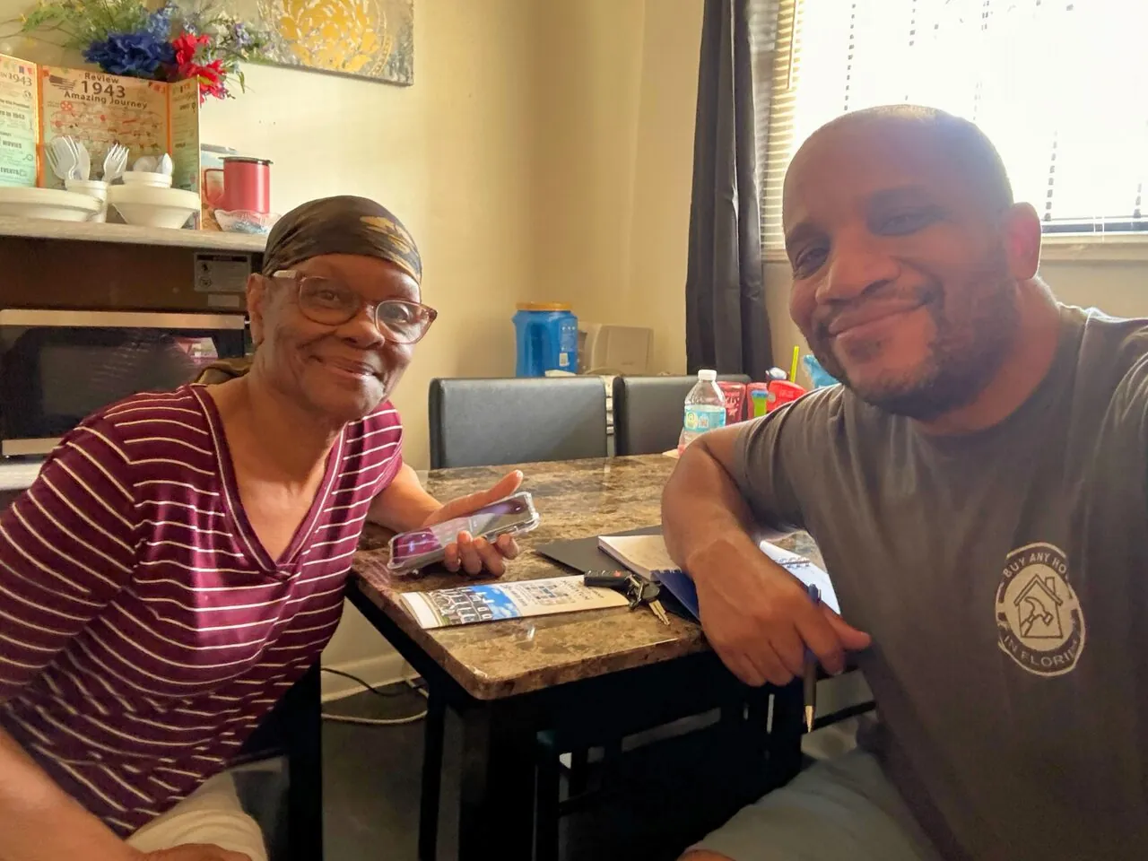 Chris sitting down with a homeowner to talk through their options — no pressure