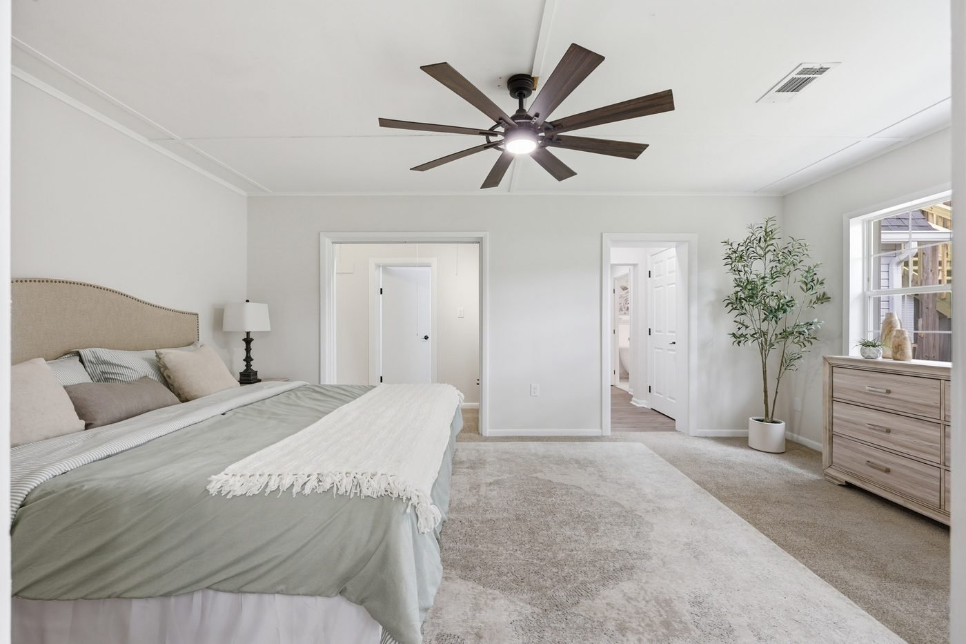 Primary bedroom of the renovated Starke home