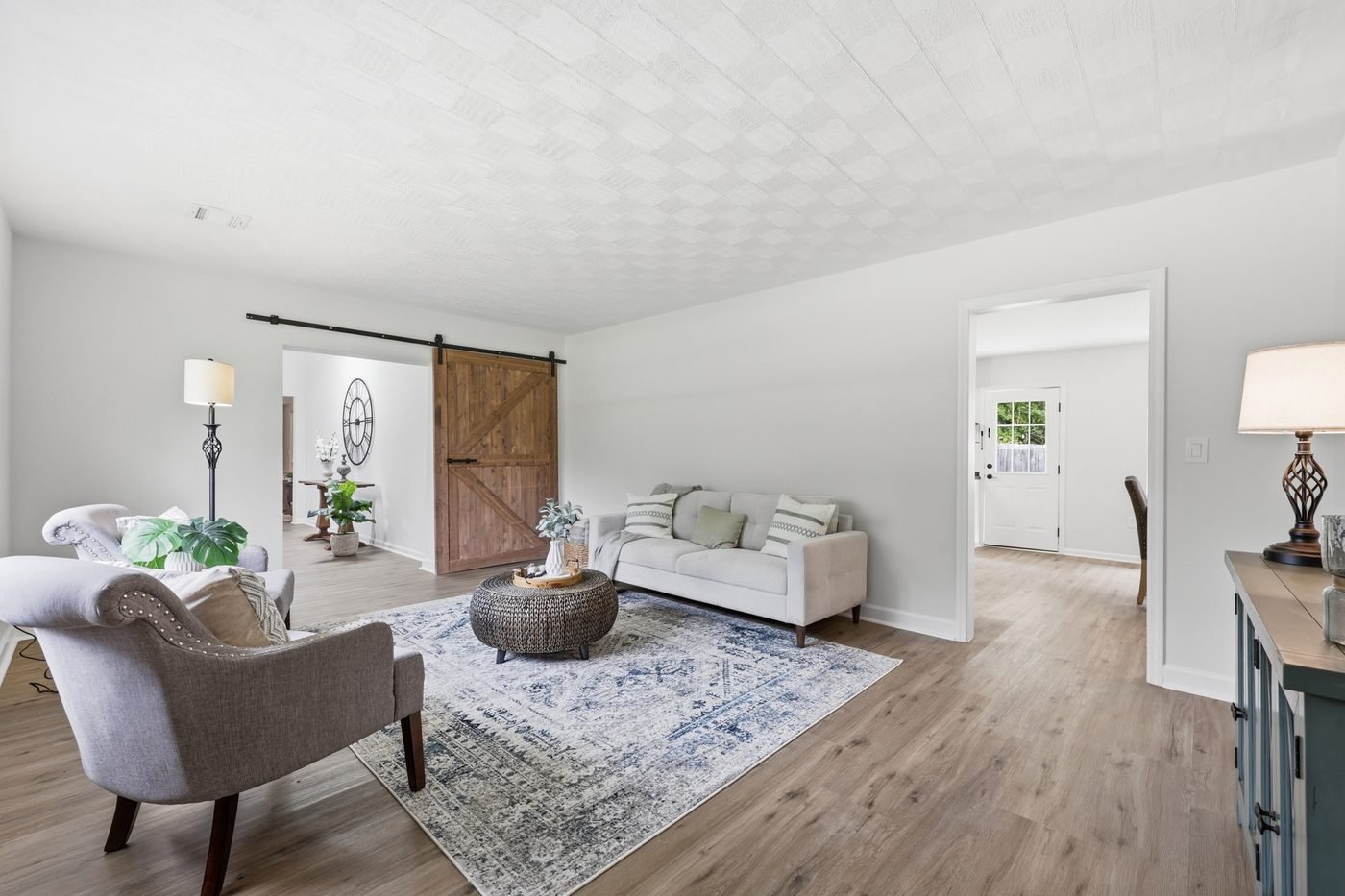 Renovated living room with vaulted ceiling